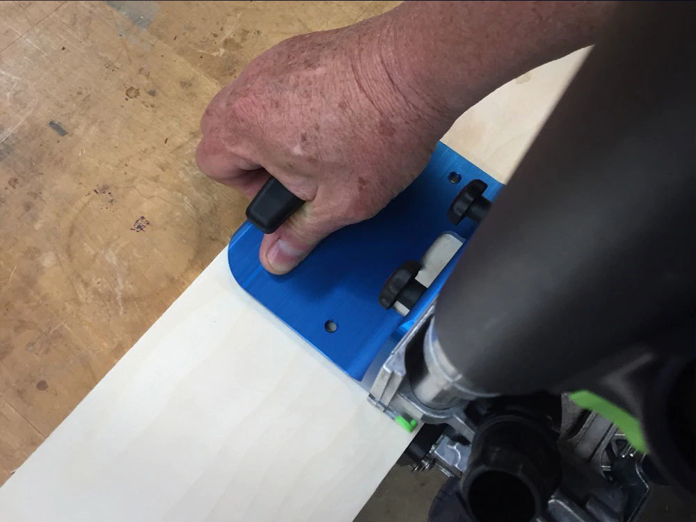 The TSO Products BigFoot right angle support being used to plunge a mortise in face of board with the Festool Domino DF 700.