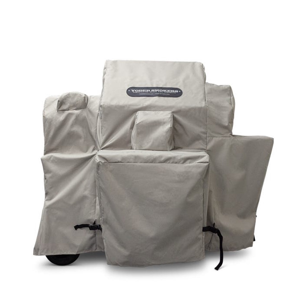The heavy-duty cover fits tightly over the grill and shelves of a Yoder Smokers YS480(s) on Competition Cart.