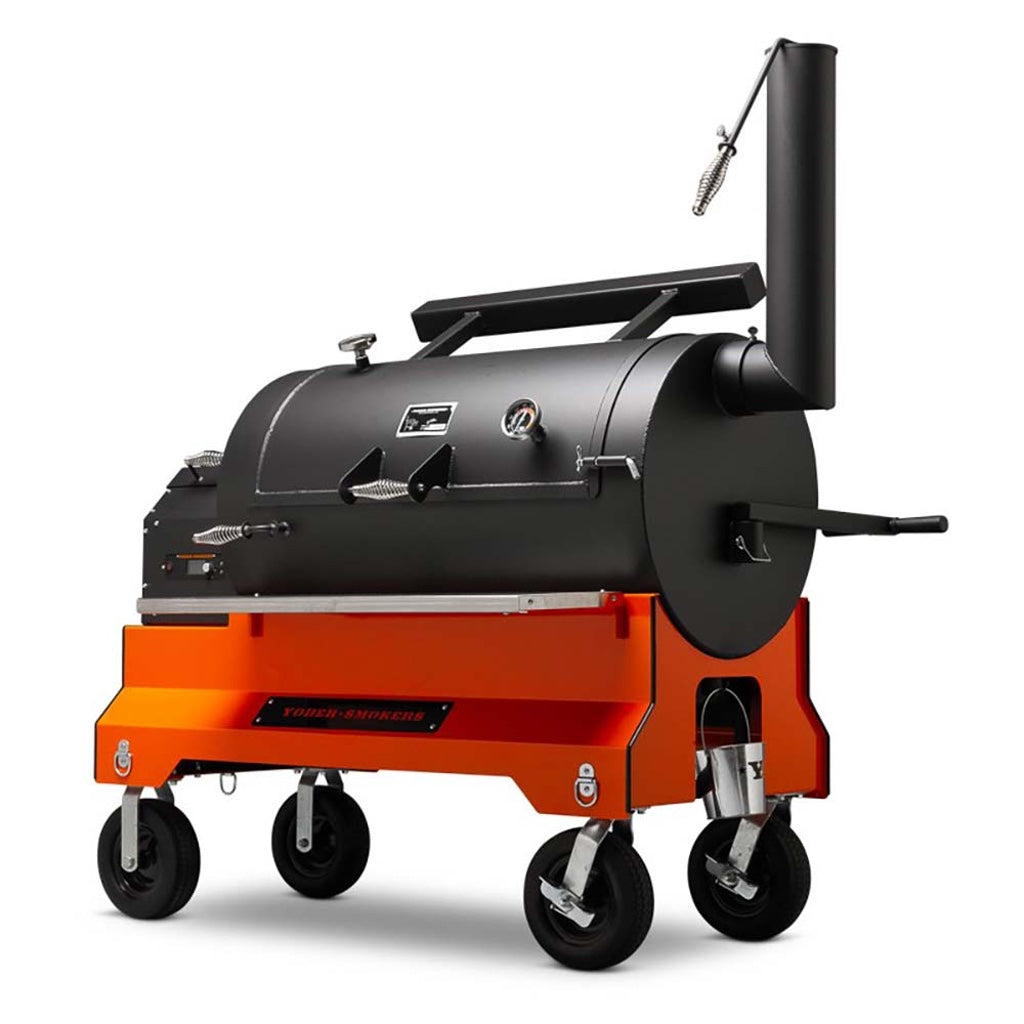 Front right view of Yoder Smokers YS1500S Pellet Grill on orange Competition Cart with pneumatic wheels.