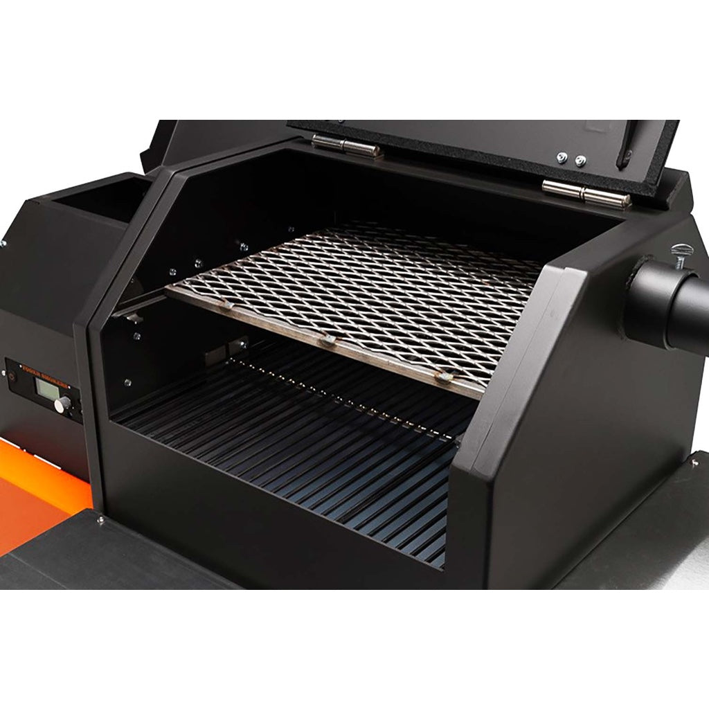 Food compartment lid open, showing pull-out second shelf and main grill of the Yoder Smokers YS480S Pellet Grill.