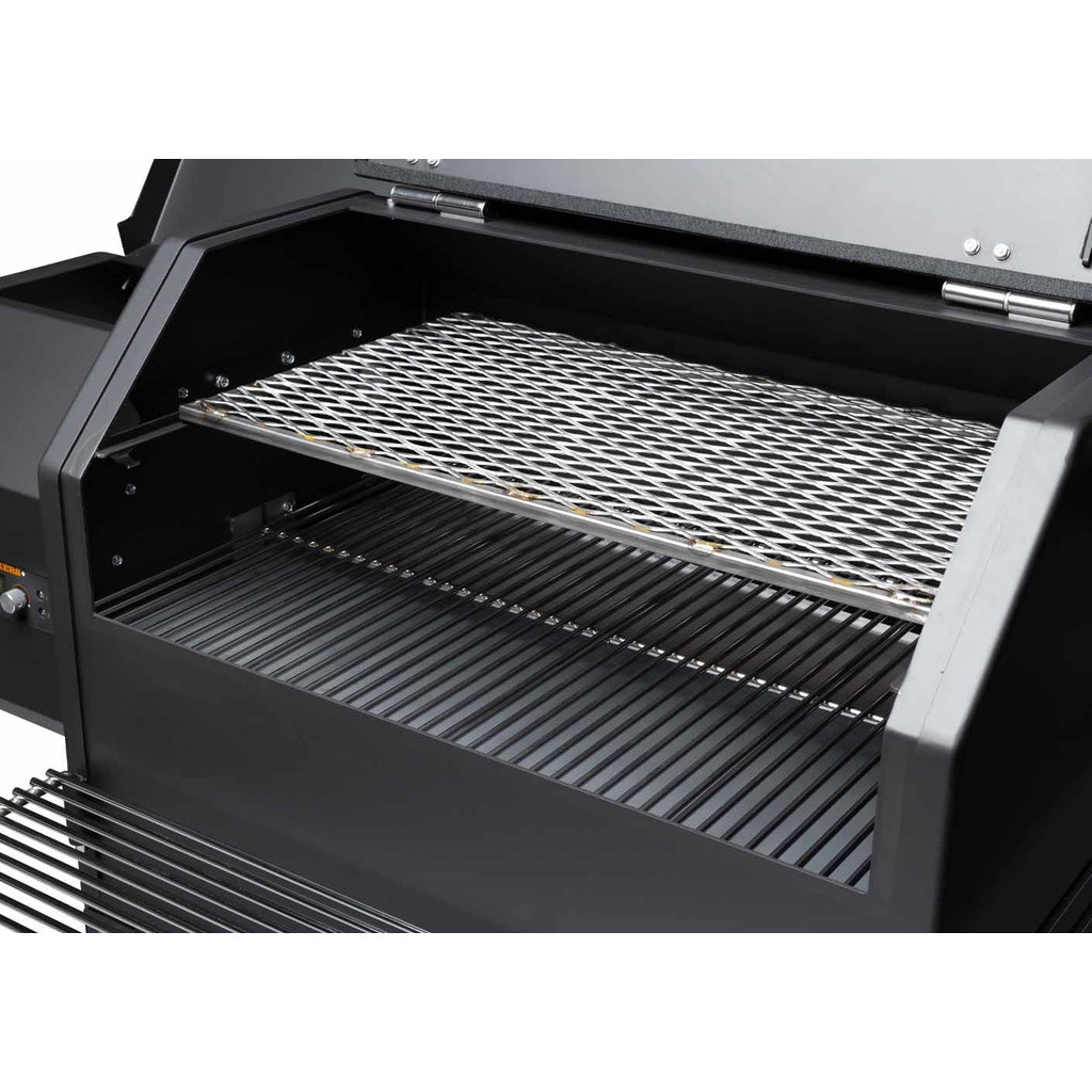 Food compartment lid open, showing pull-out second shelf and main grill of the Yoder Smokers YS640S Pellet Grill.