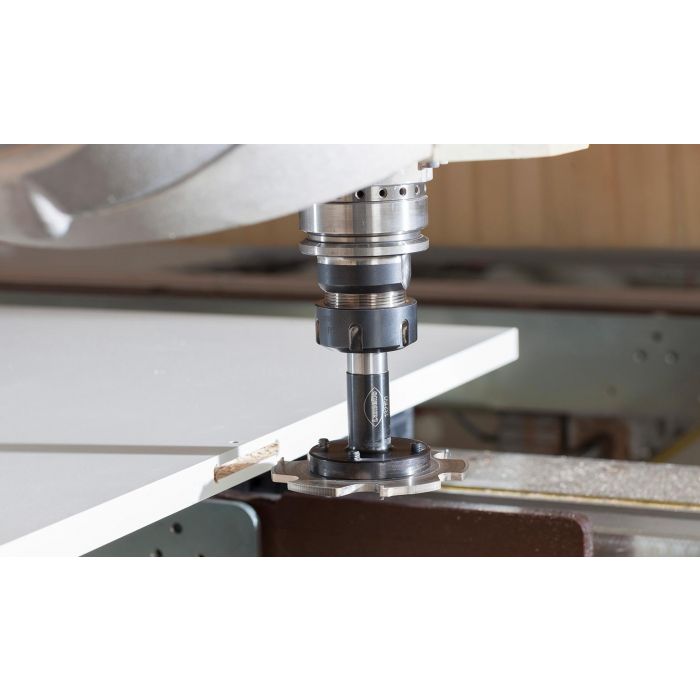 A Lamello P-System cutter in a CNC router cuts the T-shaped slot to accept a Clamex P-14 Flexus connector.